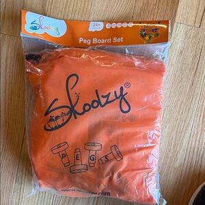 Skoodzy Orange Peg Board Set